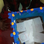 Using the alphabet box to conduct a letter _O_ activity